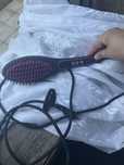Escova de alisar o cabelo e pentiar