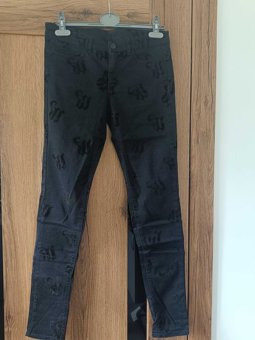 Czarne damskie jeansy H&M r.38, ze zdobieniami