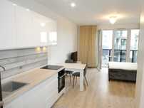 Śródmieście_Kameralne studio - nowy apartamentowiec nad woda