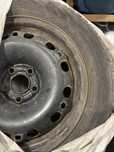 Opony zimowe i felgi stalowe 185/60R15 88T XL Skoda Rapid