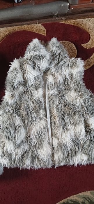 Теплі жилетки на дівчинку-підлітка