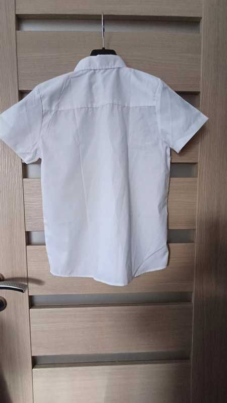 Nowa elegancka biała koszula z krótkim rękawem. R146.