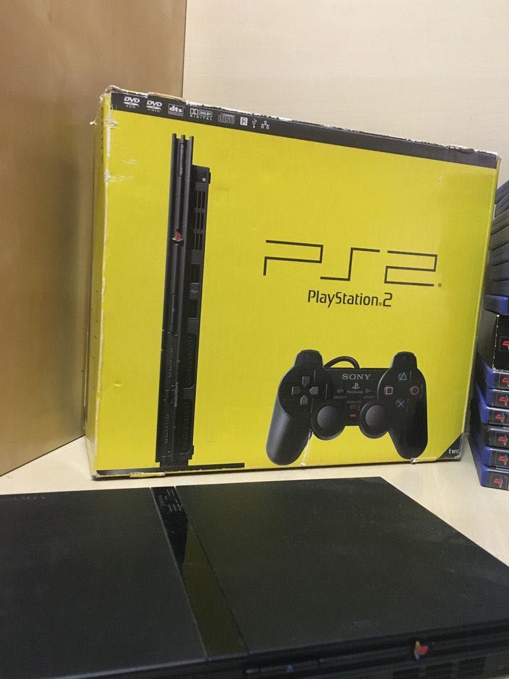 Playstation 2 Slim + 2 Comandos + 17 jogos