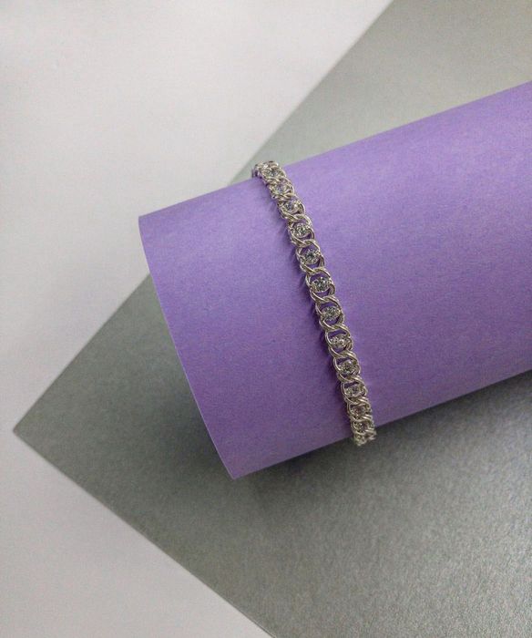 Срібний браслет з камінцями з біркою