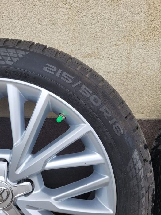 Opony zimowe wraz z felgami 215/50 R18 92V