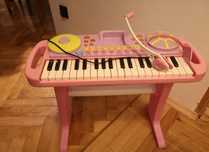 Organki z mikrofonem i z miejscem na smartfona lub odtwarzacz MP3