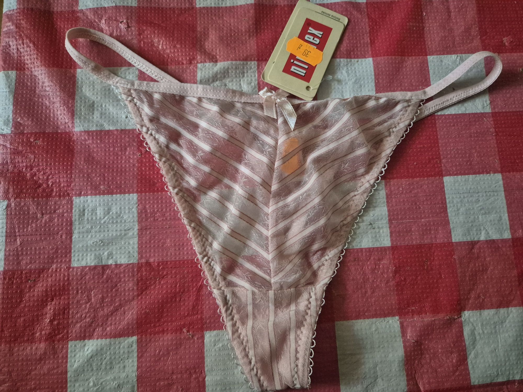 Jasnoróżowe stringi Nipplex rozmiar M nowe