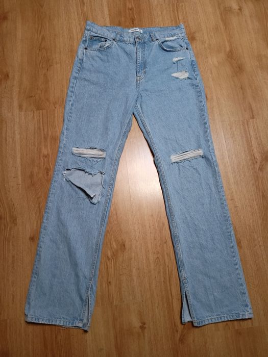 Jasne niebieskie, błękitne spodnie damskie. Szerokie nogawki, XL