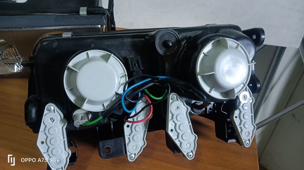 Farol Mitsubishi L300 ótica 1993