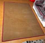 Tapete grande de sala em Sisal