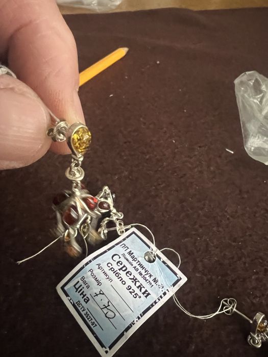 Вироби срібло з бурштином