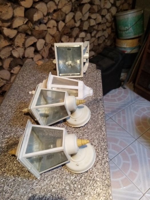 3 candeeiros e um olofote