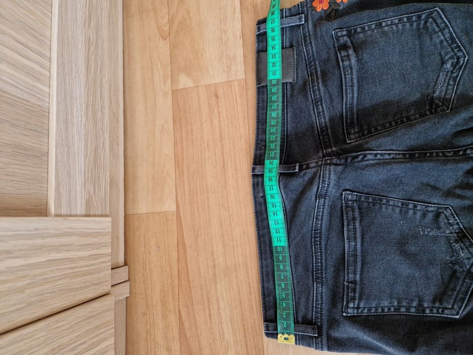 Spodnie Zara z motywem kwiatów rozmiar 38