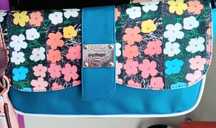 Mala nova estampada com flores