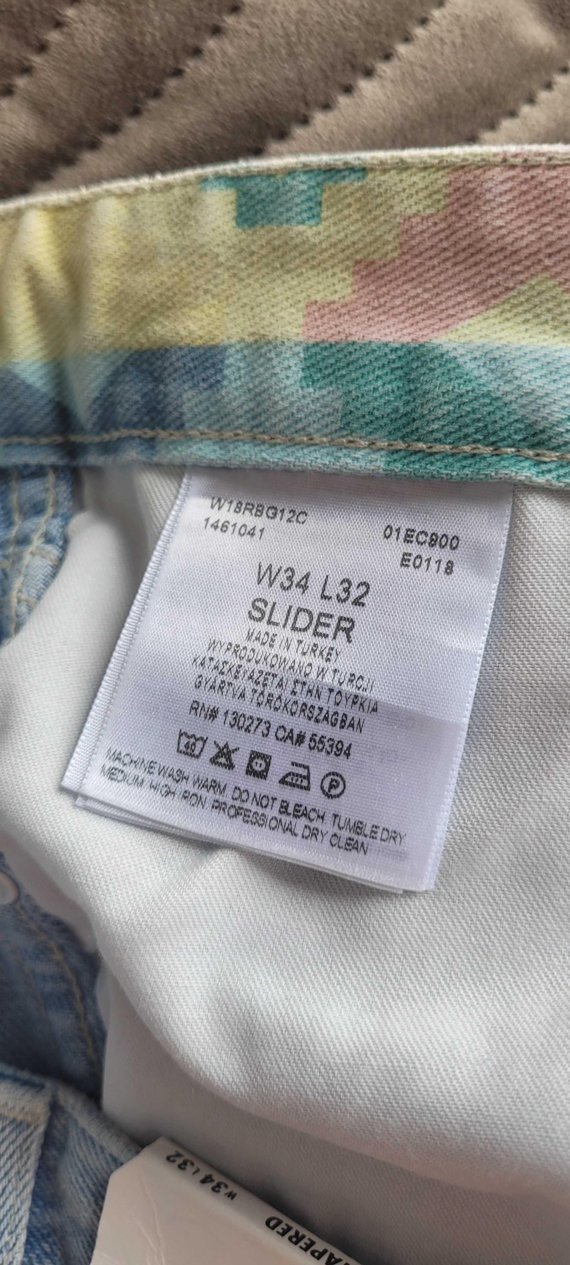 34-32 Wrangler Slider nowe z metka jeans denim spodnie jasne tapered