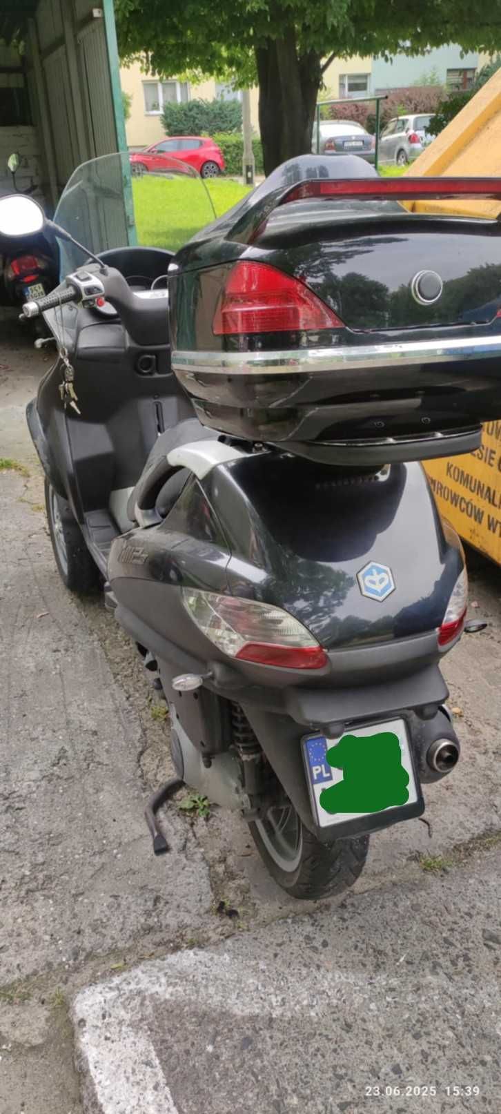 Skuter Piaggio trójkołowy