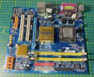 Płyta główna Gigabyte GA-G31MX-S2 z CPU, RAM i maskownicą