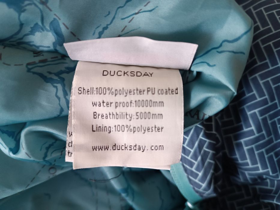 Kombinezon ducksday przeciwdeszczowy jak nowy 110-116