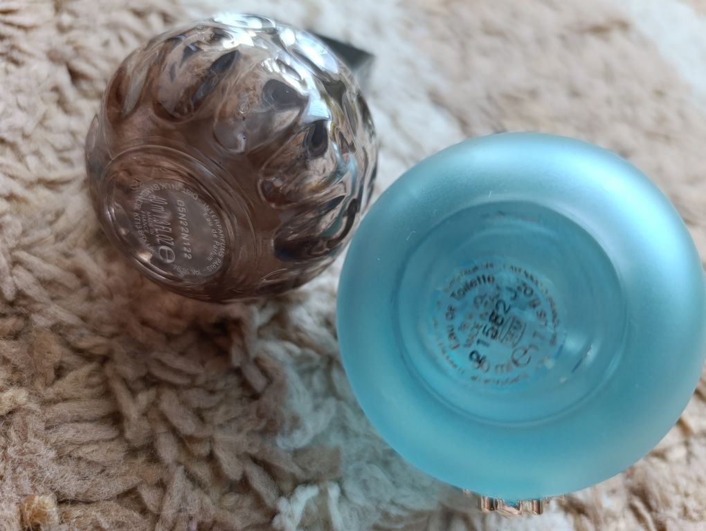 Flakon po perfumach Versace i Jimmy choo