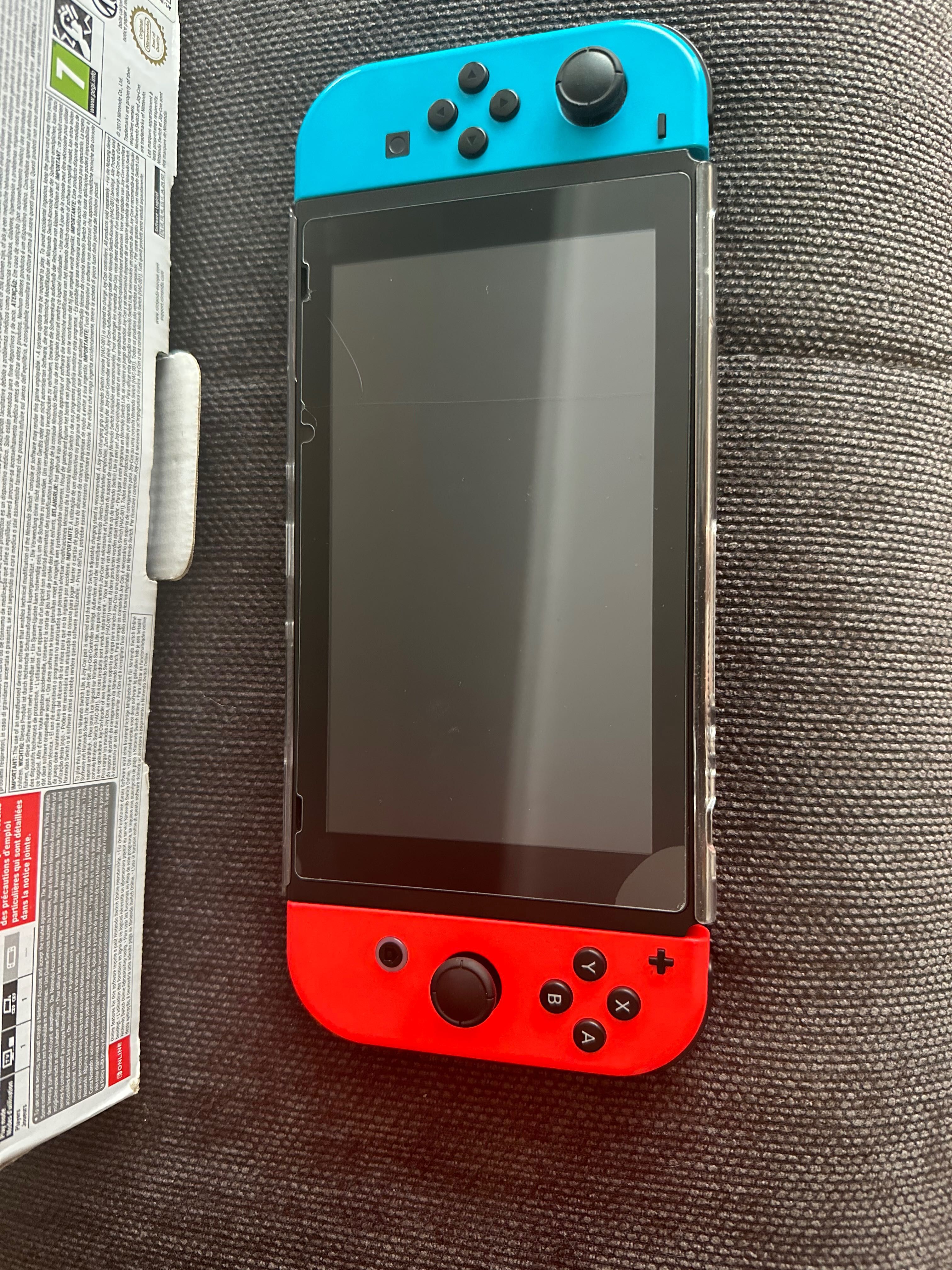 Nintendo Switch Néon + 2 comandos + jogo Ríng fit Adventure