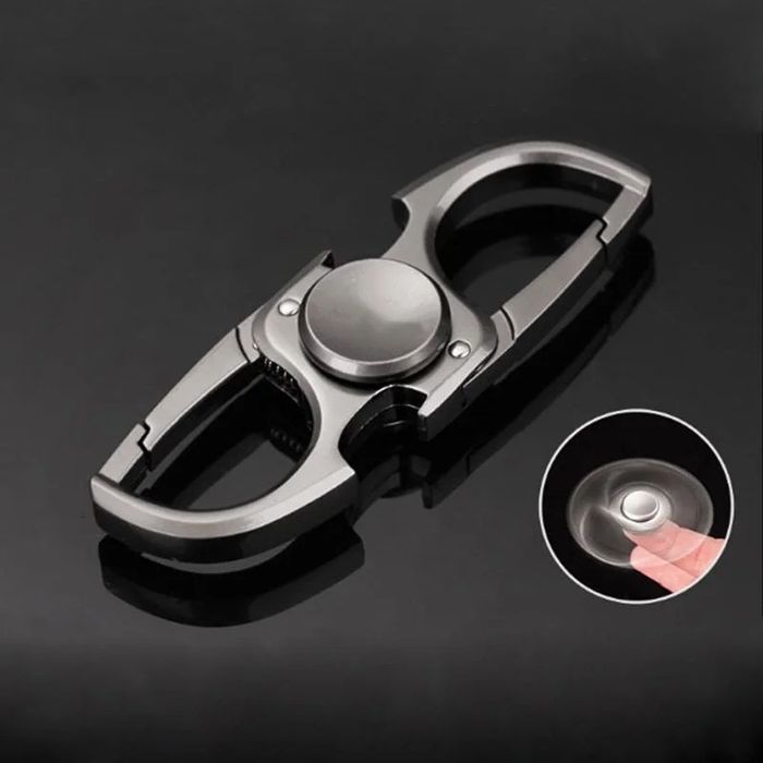 Fidget spinner, keychain/bottle opener, stress relief gadget,