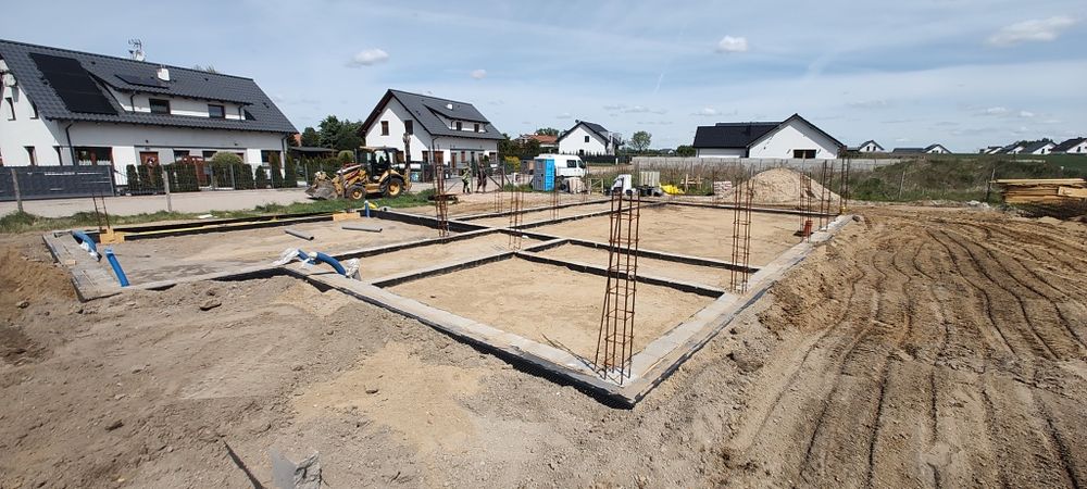 Roboty Ziemne Usługi koparko  ładowarką CAT Pracę Ziemne Odśnieżanie