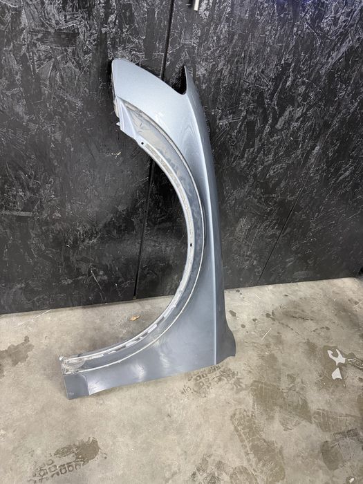 Крило ліве Audi A4 B8 Allroad 12-16 рік рестайл код фарби LX7R \ Крыло