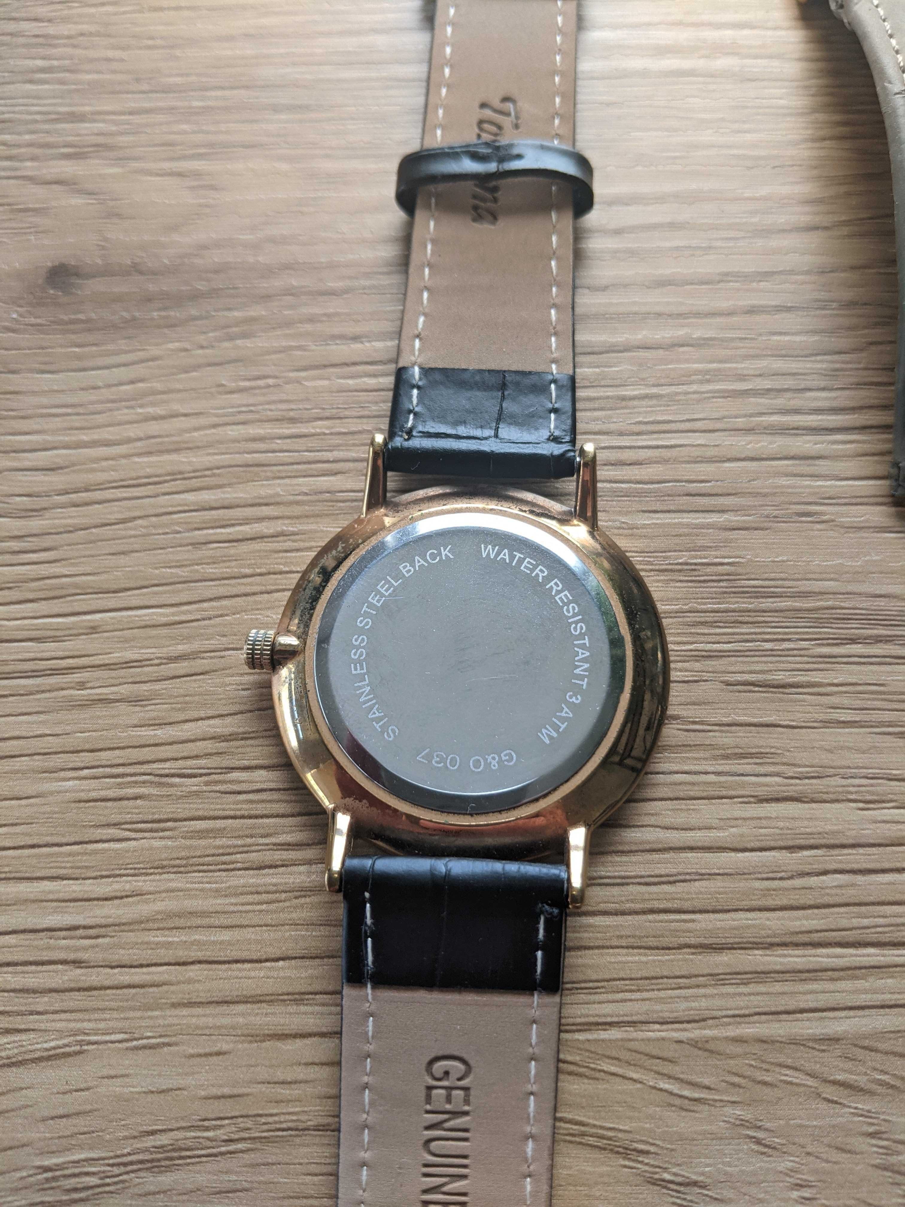trzy zegarki na rękę, timex oraz inne