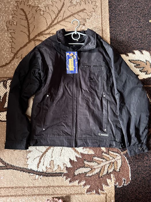 Куртки нові жіночі та чоловічі