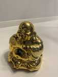 Złota figurka budda