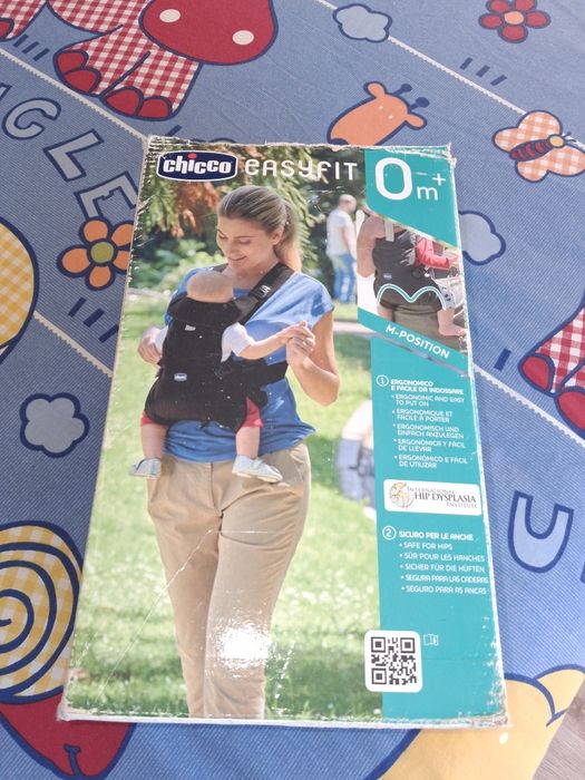 Marsupio, andador e mesa de sons