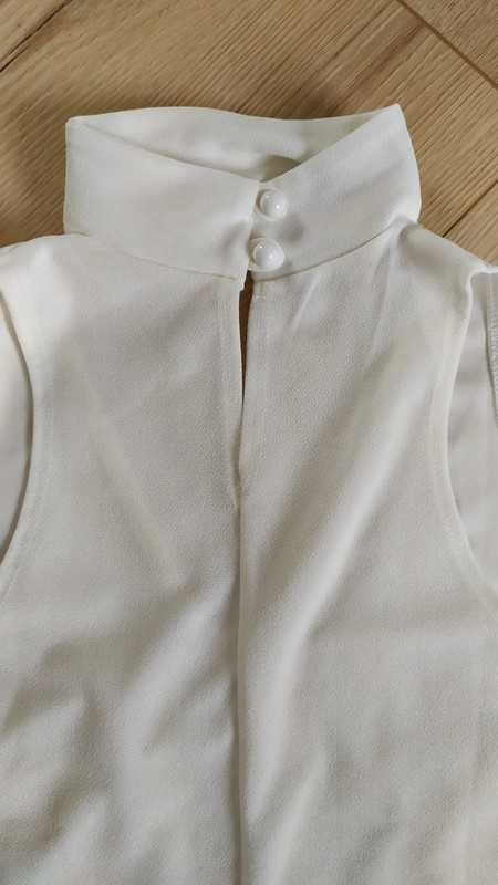 Biała sukienka bez rękawów z dekoltem choker r.36