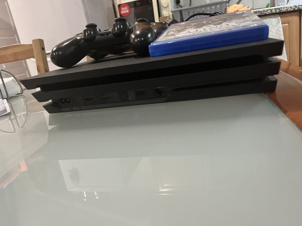 Playstation 4  semi novo ,e comandos