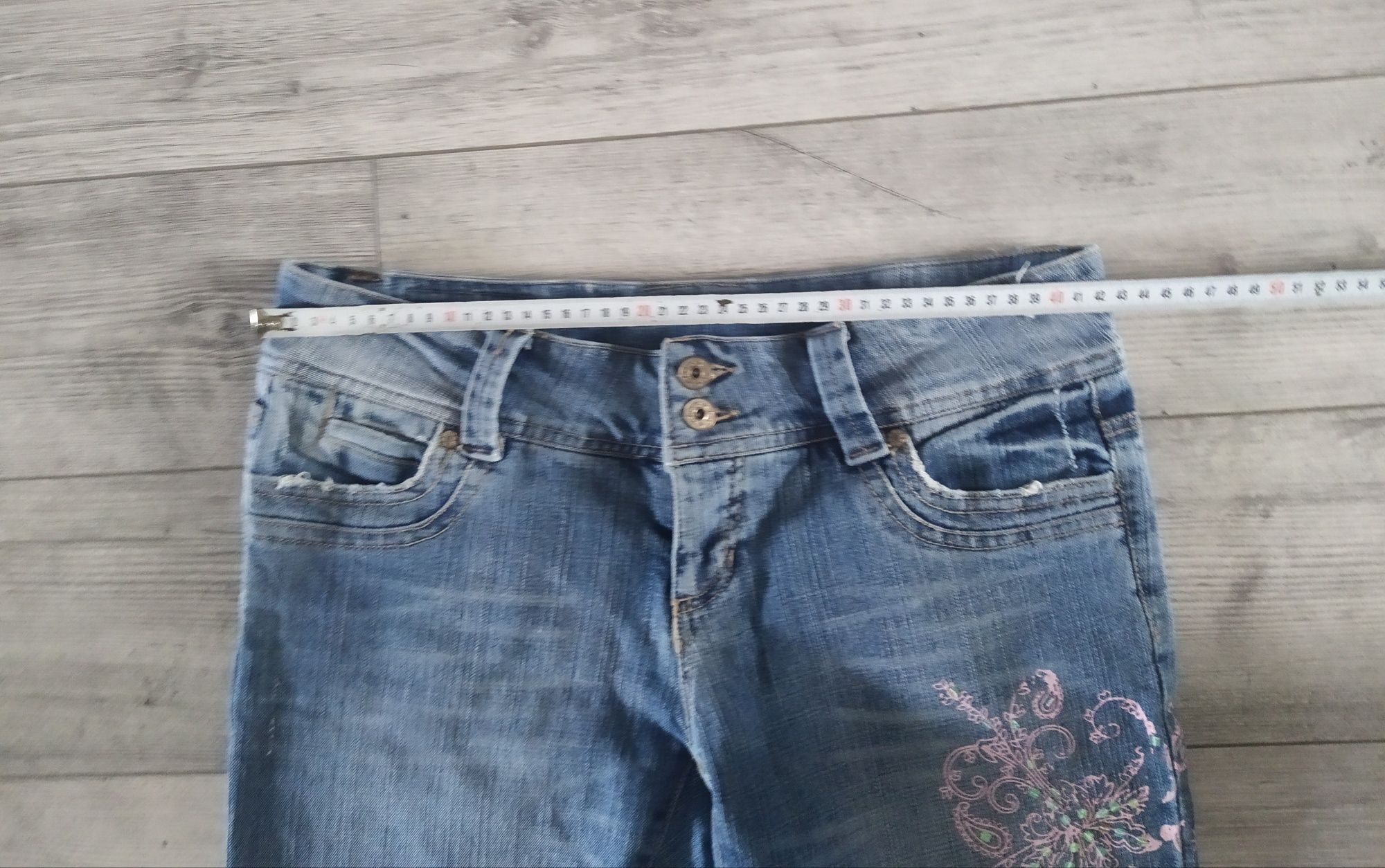 Spodnie jeansowe rybaczki damskie