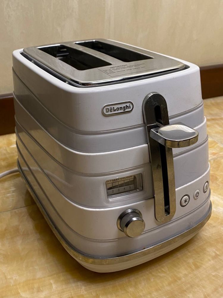 Тостер Delonghi