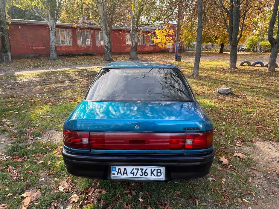 Mazda 323 расход 7л/100км