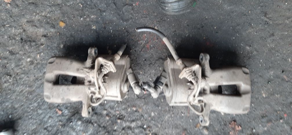 Zacisk hamulcowy tył passat b6 elektryczny lewy prawy