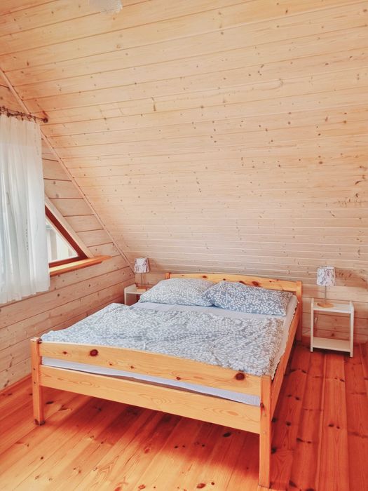 Domek nad jeziorem z linią brzegową na Mazurach Ryn Rybical - Staś