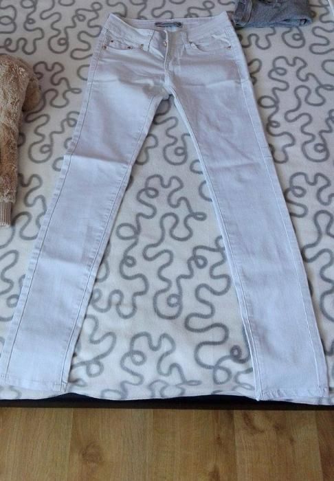 białe materiałowe spodnie S