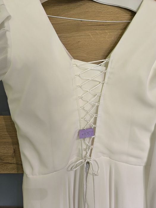 Piękna suknia ślubna Boho dla wysokich