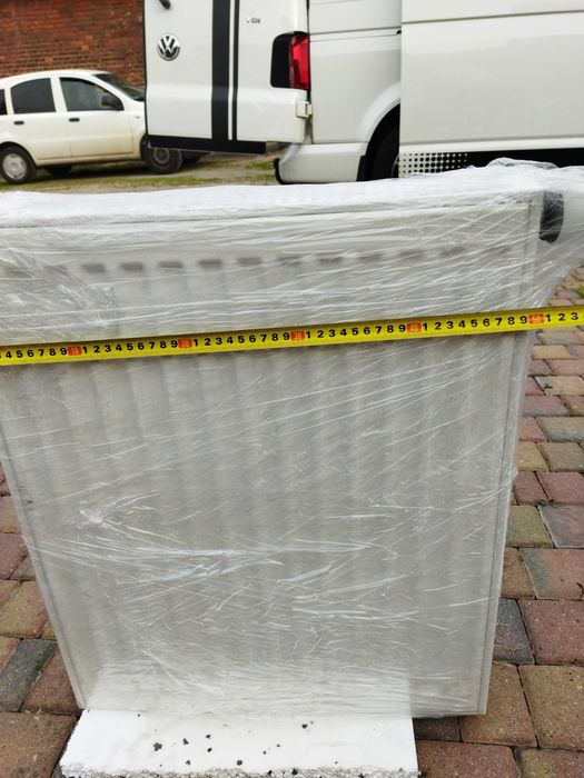 Dwa grzejniki (50cm i 60cm) z termostatami