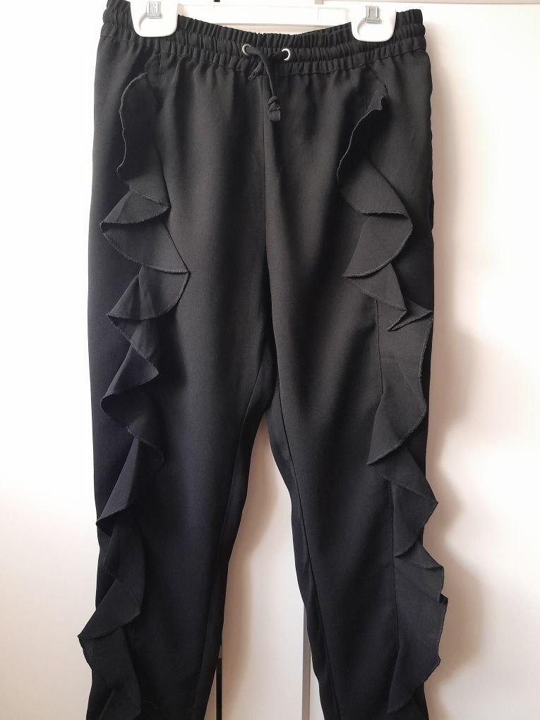 Eleganckie spodnie KappAhl 140 czarne.