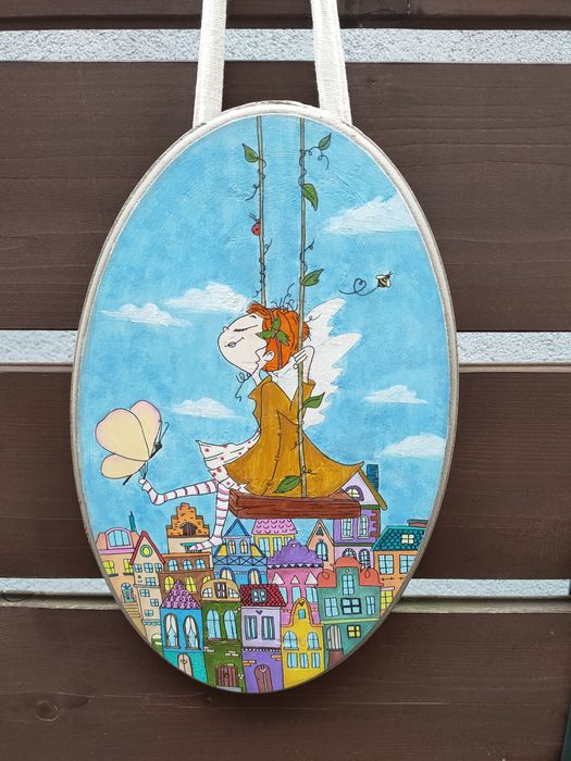 Obraz wróżki nad miastem