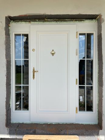Drzwi zewnętrzne angielskie dębowe z doświetleniem bocznym Producent