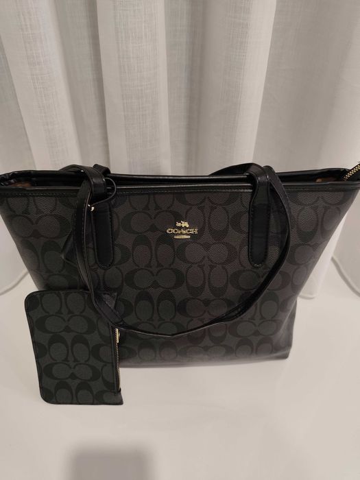 Mala Coach como nova