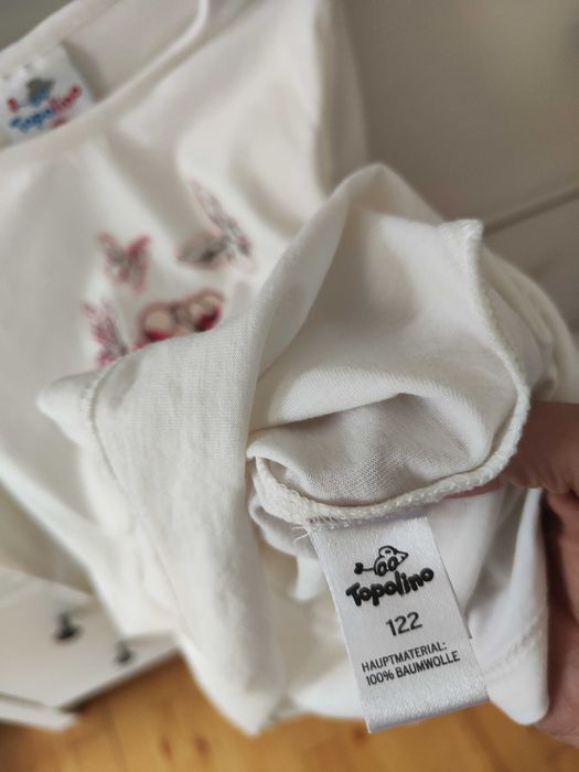 Biała tunika z prezentem 122 cm Topolino