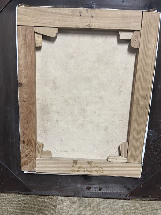 Quadro com moldura dourada