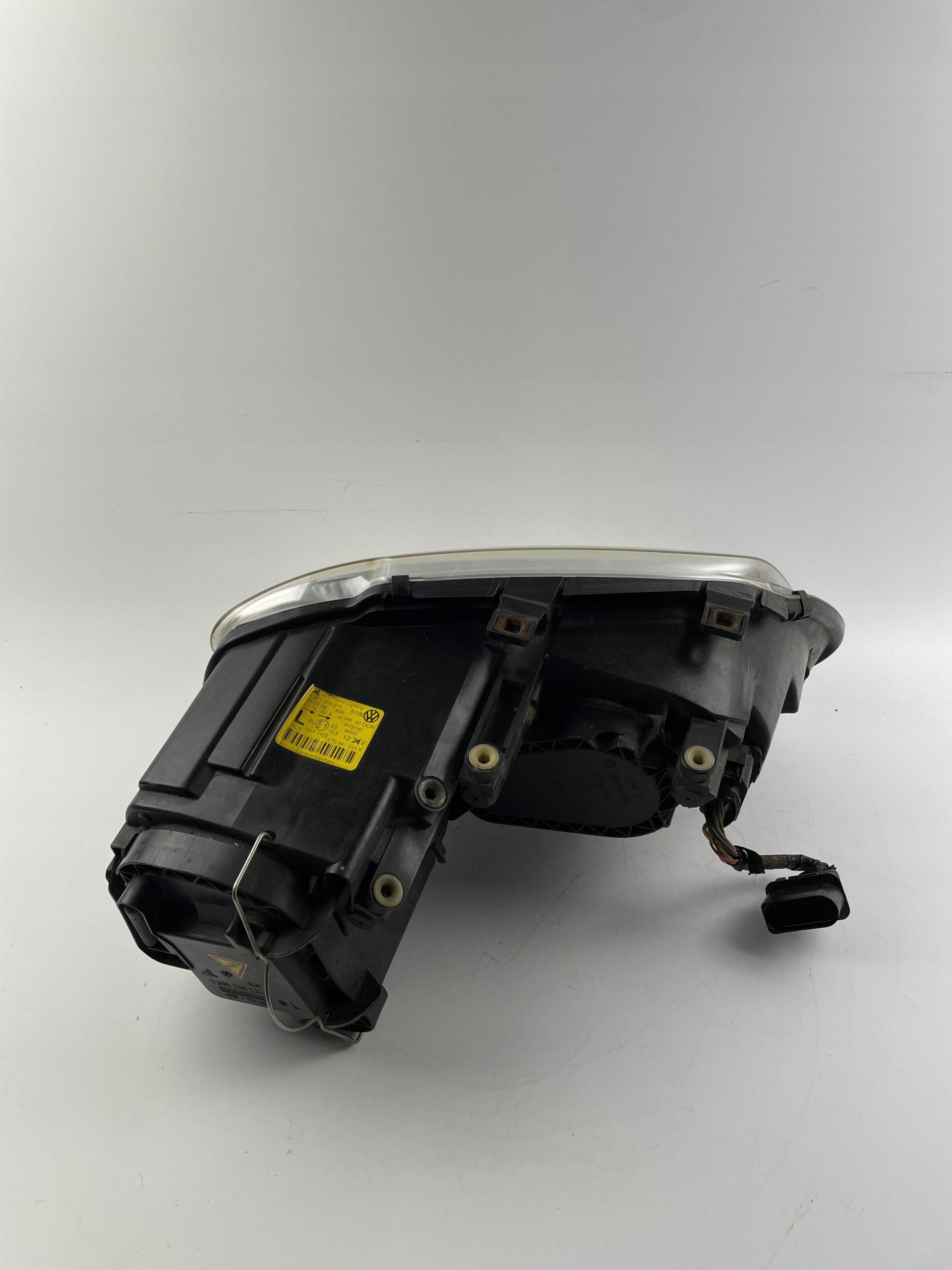 VW TOURAN I CADDY lampa przednia lewa xenon