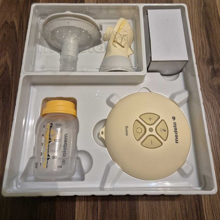 Laktator Medela Swing Flex + gratis butelka antykolkowa.