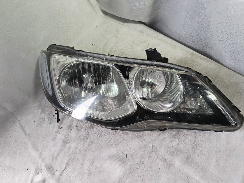 Lampa lewa Honda Civic 7 VII Sedan Europa reflektor przedni